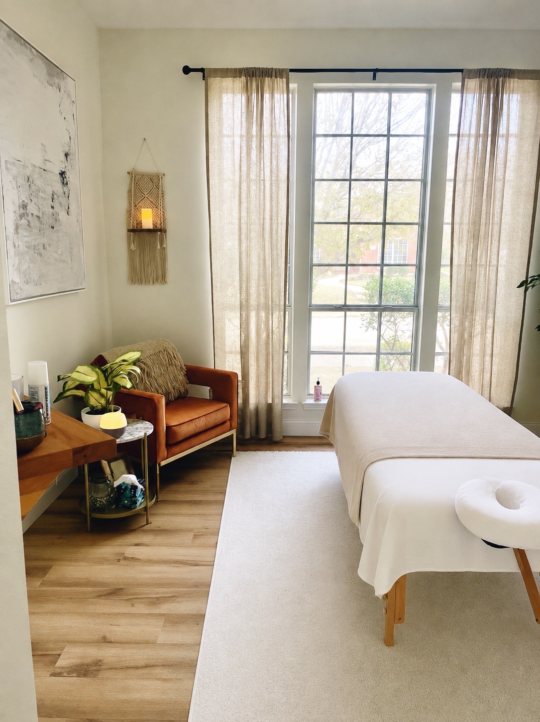 Inside the private studio — warm natural light, a draped table, and a quiet corner to settle in